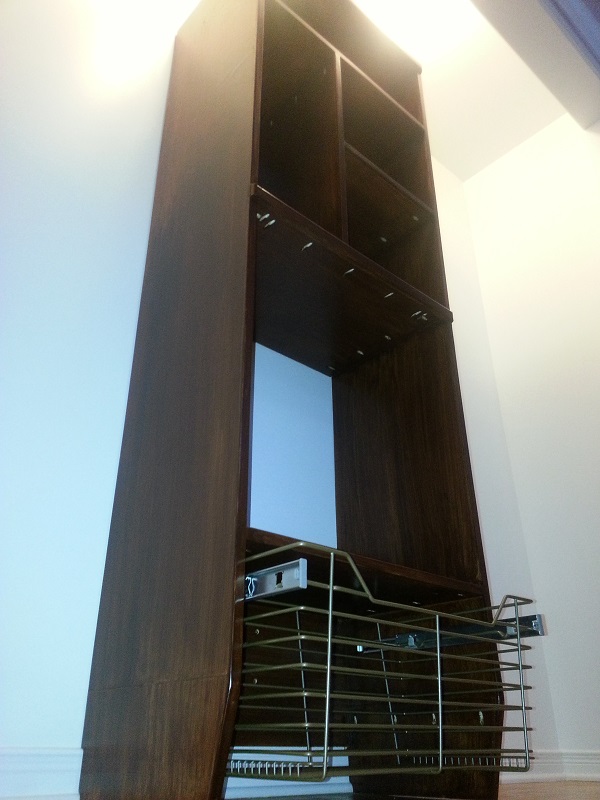 Closet cabinet with sliding basket