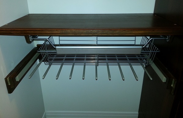 Shelf, sliding basket and pants rack installed